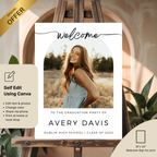 Graduation party invitation sign with a photo of a woman on an easel.